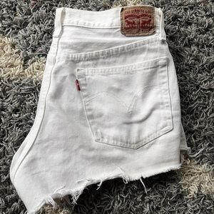 Levi’s vintage white low rise denim shorts.